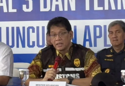 Menteri Keuangan Purbaya Yudhi Sadewa saat memberikan keterangan pers terkait peluncuran teknologi baru pengawasan di Pelabuhan Tanjung Priok.